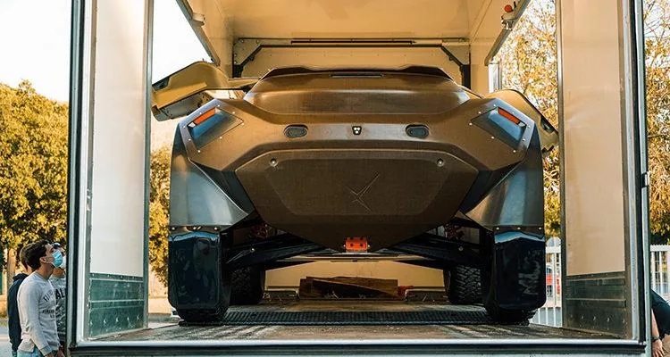 A car in a garageDescription automatically generated