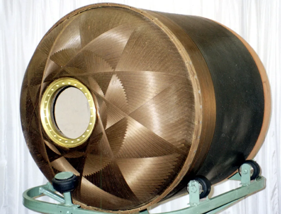 A large cylindrical object with a round holeDescription automatically generated