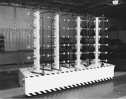 Rotating fiber package creel