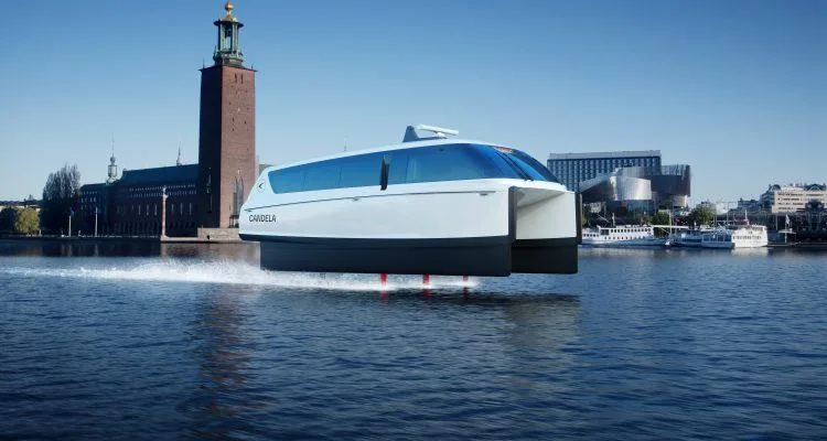 A white and black boat on waterDescription automatically generated
