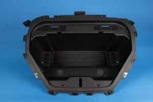 A black plastic container with holesDescription automatically generated