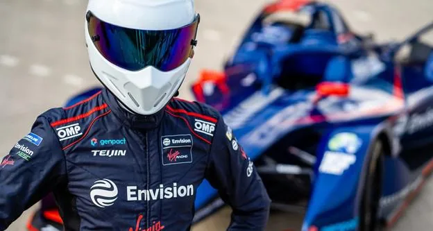 A person wearing a helmet and a helmetDescription automatically generated