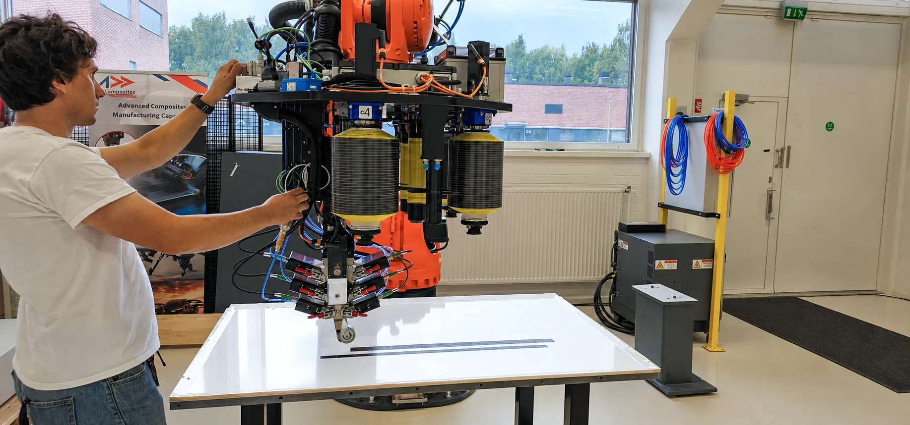 An Addcomposites engineer validating an automated fiber-placement process