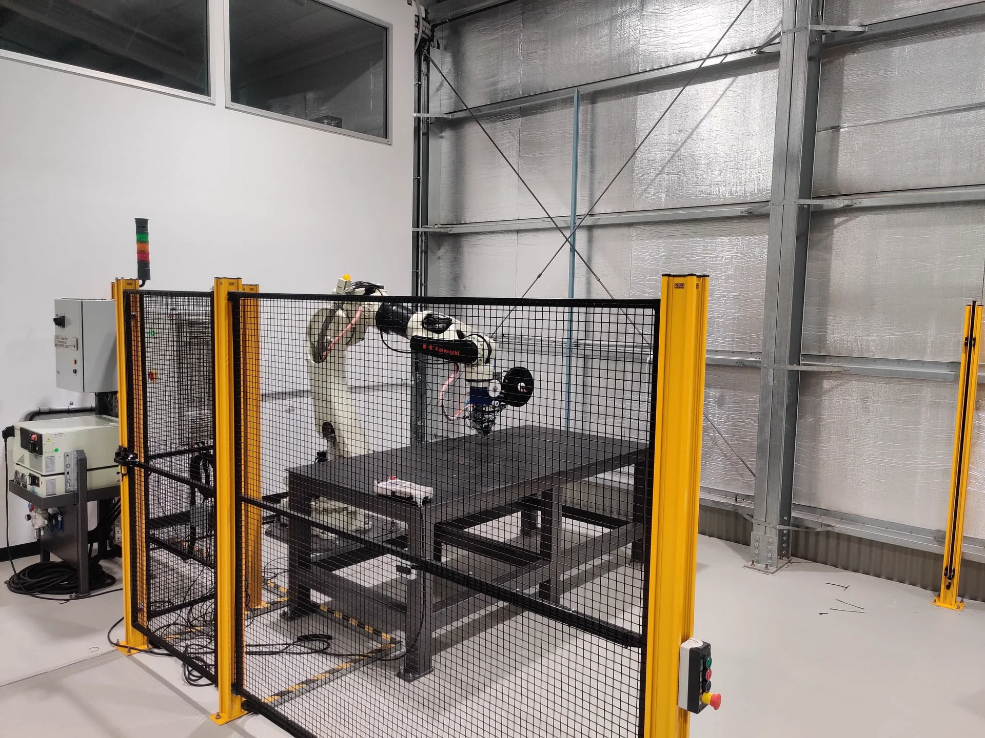 Complete enclosed AddCell robotic composite manufacturing system