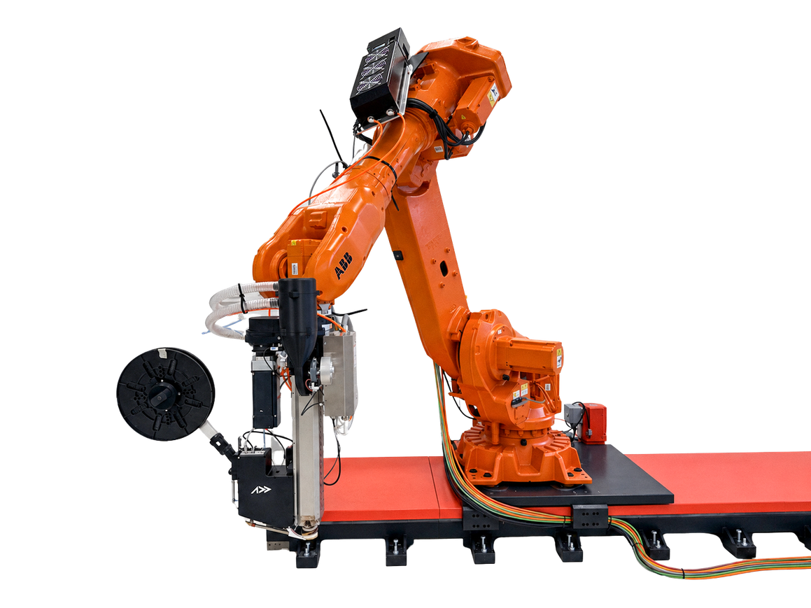 Complete AddX continuous-fiber LFAM system mounted on an ABB industrial robot and track