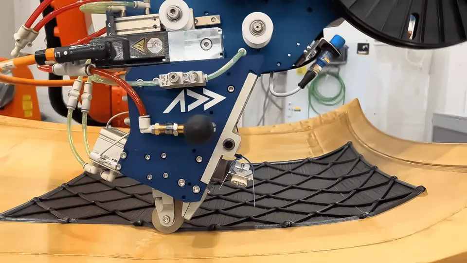 Orthogrid composite automotive roof panel produced with automated fiber placement