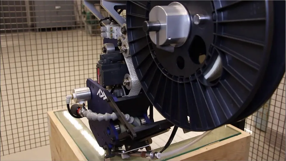 FANUC robot with AFP-XS head performing dry fiber placement