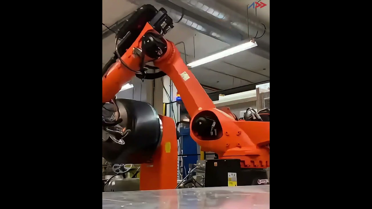 Real robot-mounted AFP-XS producing a Type V composite tank